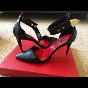 CHARLES JOURDAN Raven pumps.